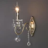 Классическое бра с хрусталем Eurosvet 10104/1 античная бронза/прозрачный хрусталь Strotskis